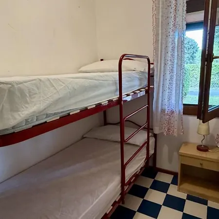 Lovely With Pool, Garden And Fireplace Apartment Bibione