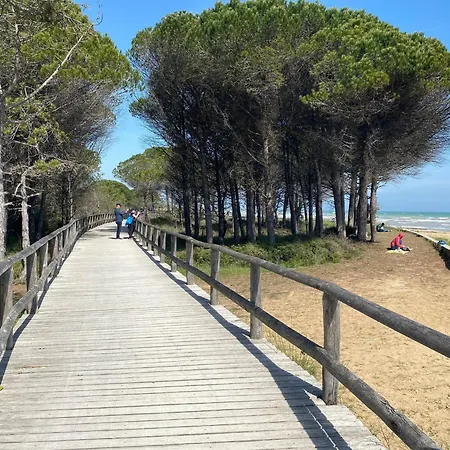 Lovely With Pool, Garden And Fireplace Apartment Bibione